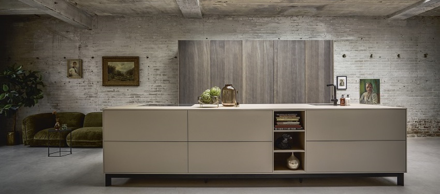 Modern kitchen by Next 125 with Sahara Grey lacquer and Pearl Grey Oak finishes, with tall folding doors to hide units and metal frame on island instead of plinth